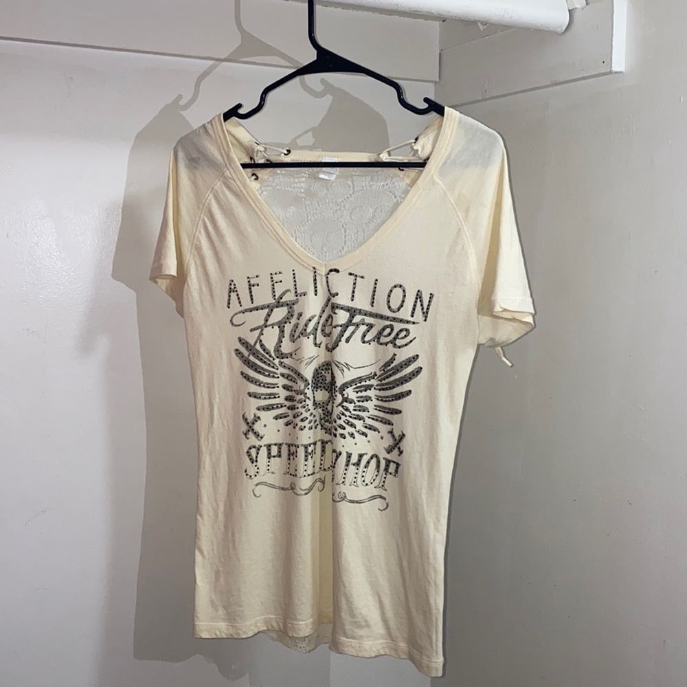 cream colored affliction shirt